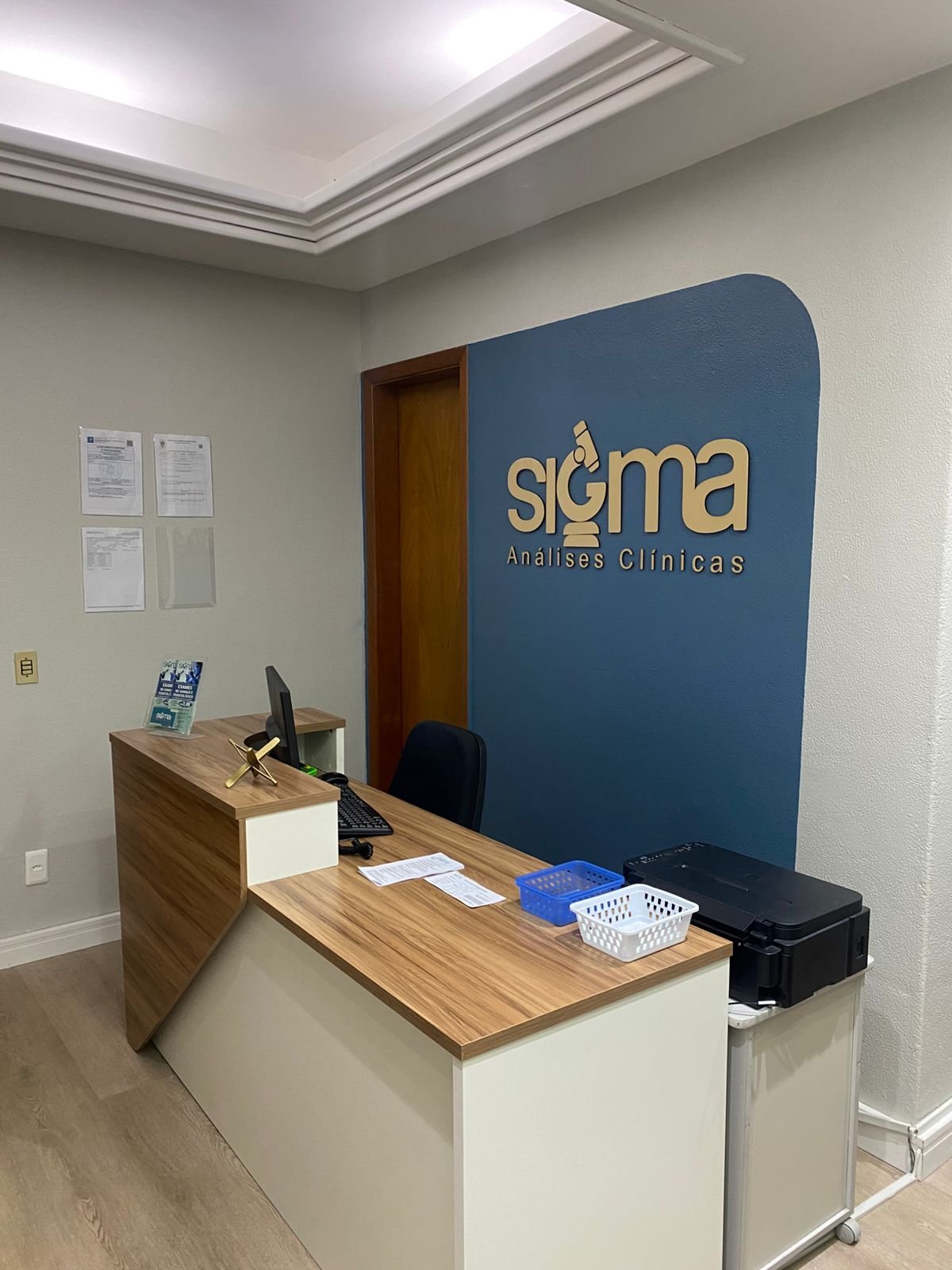 Recepção com logo da Sigma